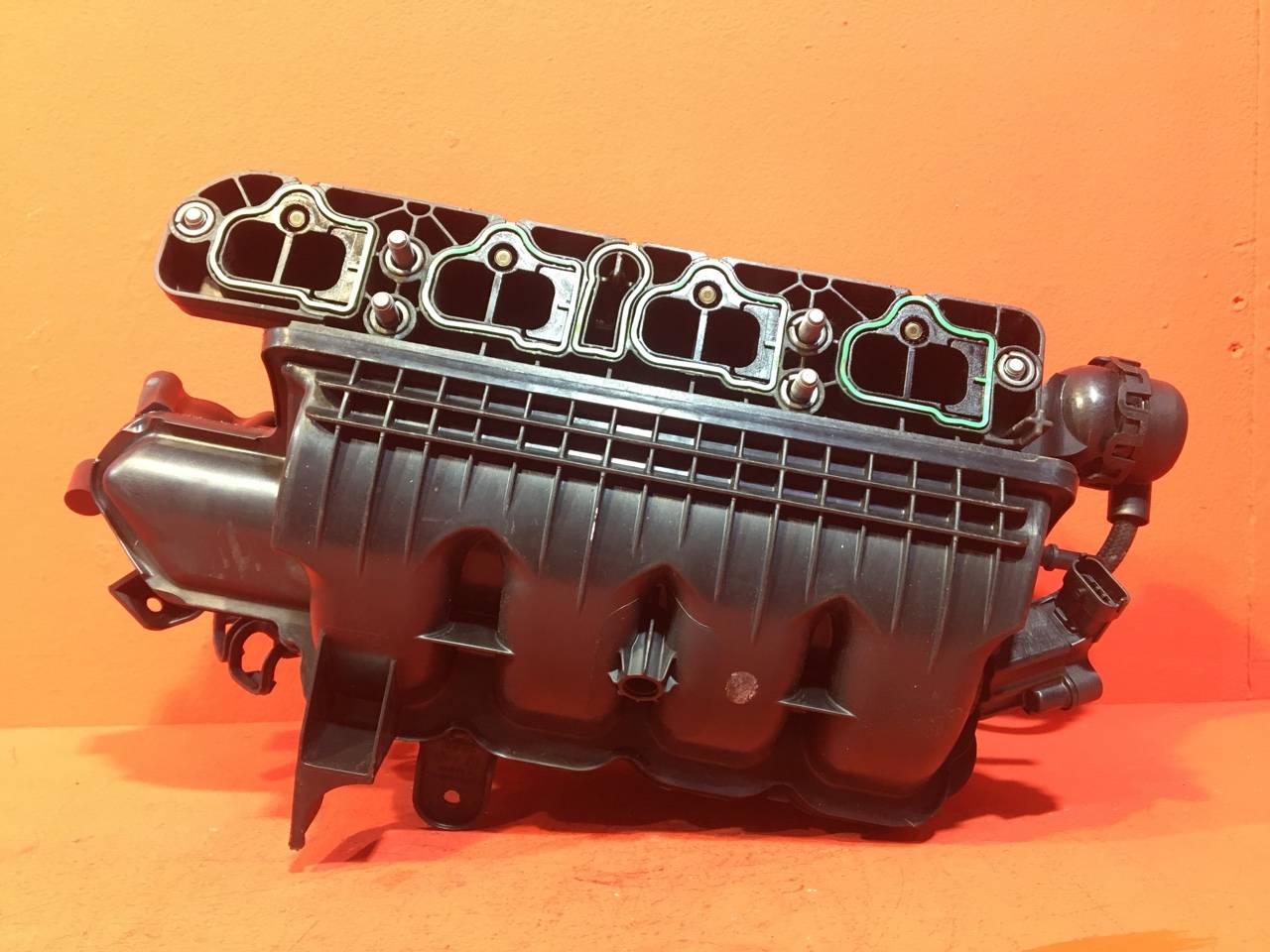 Коллектор впускной Opel Corsa D