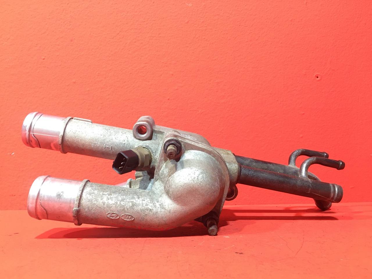 Корпус термостата Kia Sportage 2