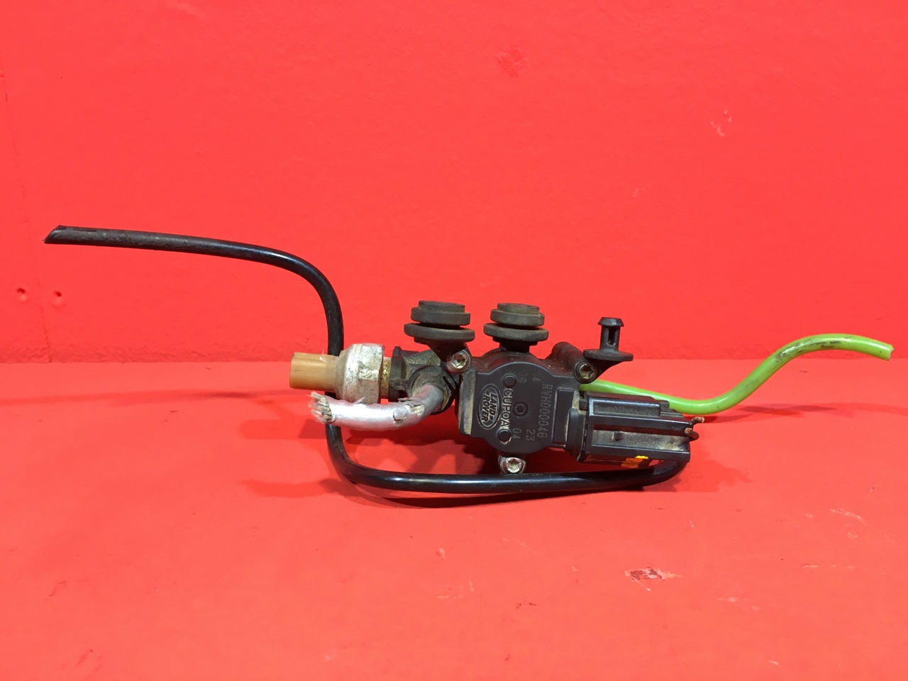 Блок клапанов пневмоподвески Land Rover Discovery 3