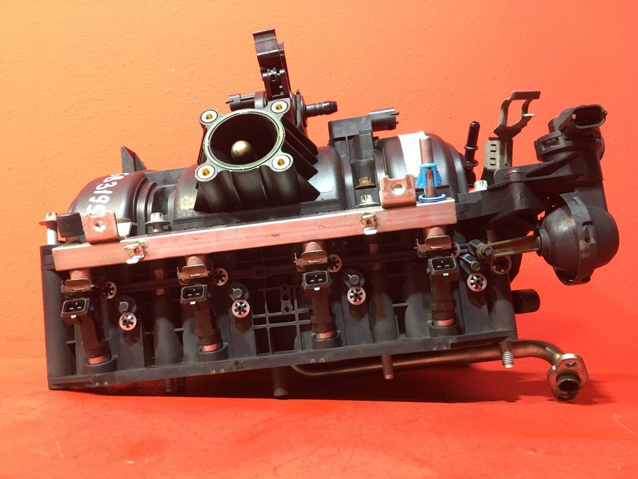 Коллектор впускной Opel Corsa D