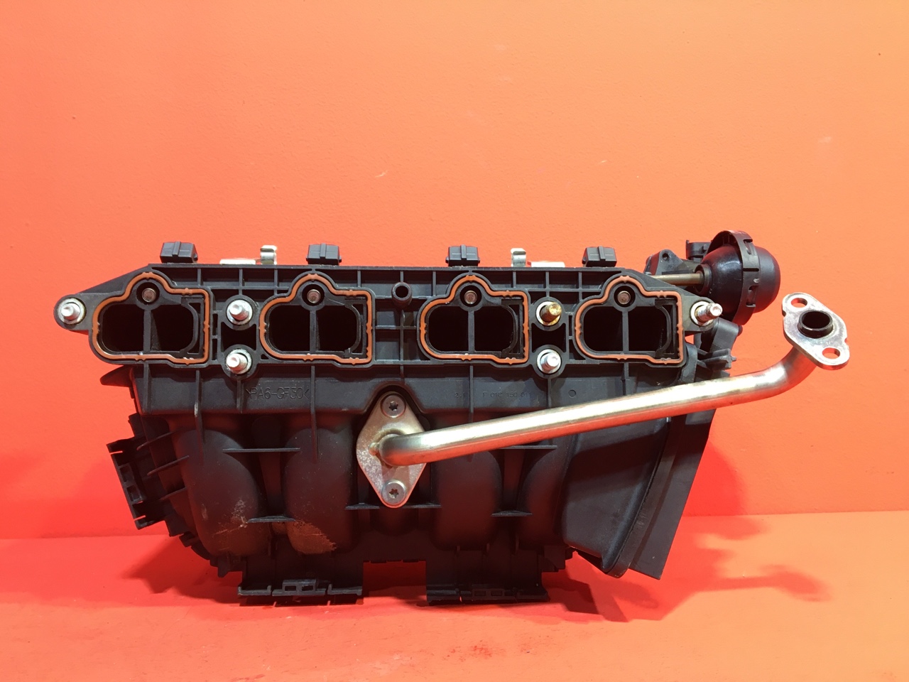 Коллектор впускной Opel Corsa D