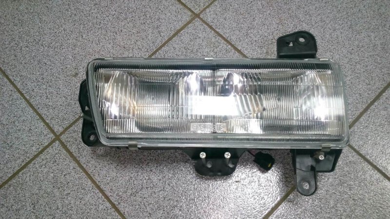 Фара MAZDA TITAN 1991-1994 L. 8BW851040.