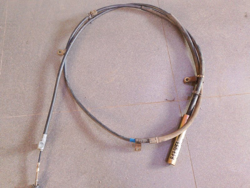 Трос ручного тормоза Isuzu Elf NPR72G-7401137 4HJ1-744394 2000 (б/у)