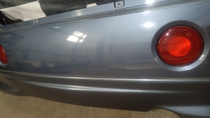 Бампер SUZUKI CHEVROLET CRUZE HR52S M13A 2004 задний (б/у) Бампер SUZUKI CHEVROLET CRUZE HR52S M13A 2004 задний (б/у)