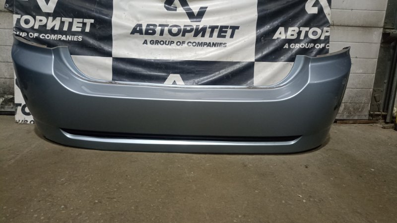 Бампер TOYOTA COROLLA RUNX NZE121 1NZFE 2005 задний (б/у)