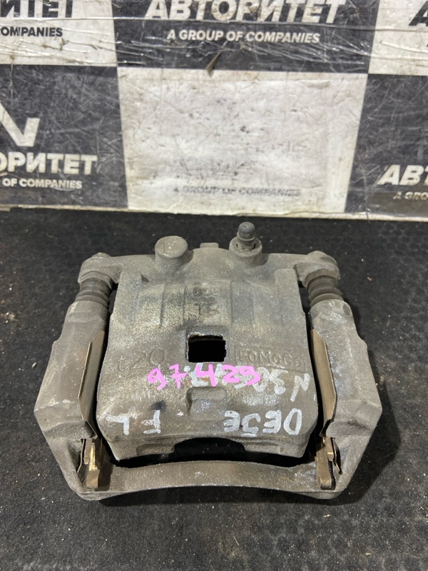 Суппорт MAZDA DEMIO DE5FS ZYVE передний левый (б/у) Суппорт MAZDA DEMIO DE5FS ZYVE передний левый (б/у)