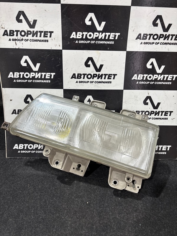Фара ISUZU ELF NKR66E 4HF1 левая (б/у)