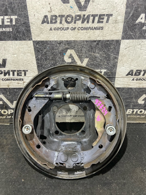 Тормозной механизм TOYOTA COROLLA SPACIO NZE121 1NZFE задний левый (б/у)