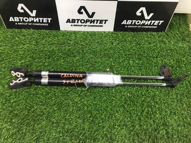 Амортизатор 5-й двери TOYOTA CALDINA ST210 1999 (б/у)