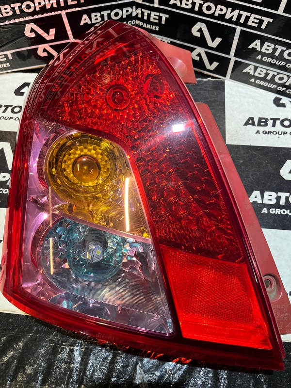 Стоп-сигнал SUZUKI SWIFT ZD11S левый (б/у)