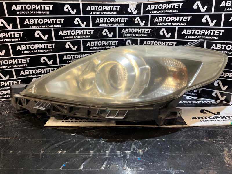 Фара MAZDA PREMACY CREW левая (б/у)