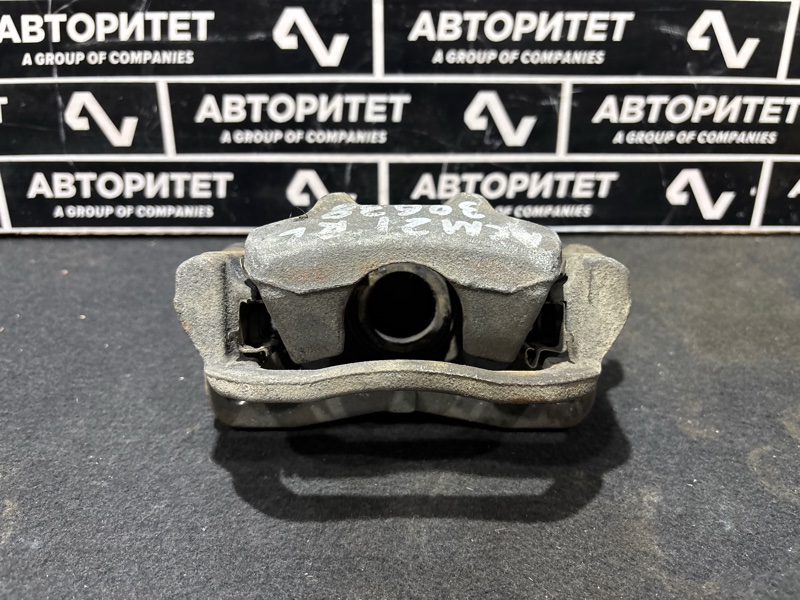 Суппорт TOYOTA IPSUM ACM21W 2AZFE задний левый (б/у)