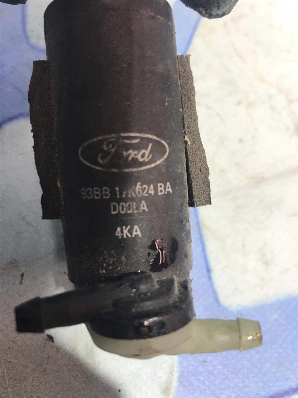 Насос омывателя Mazda