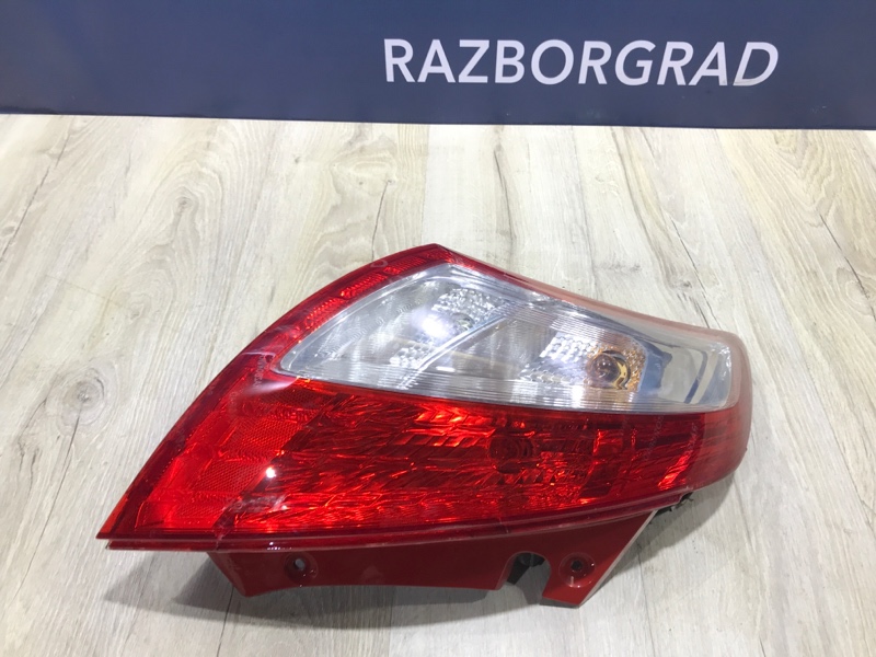 Фонарь левый Swift 2011 FZ/NZ 1.2 K12B