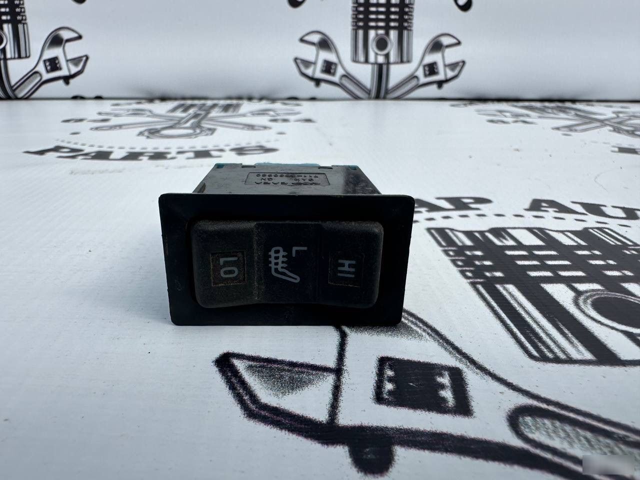 Кнопка обогрева сидения