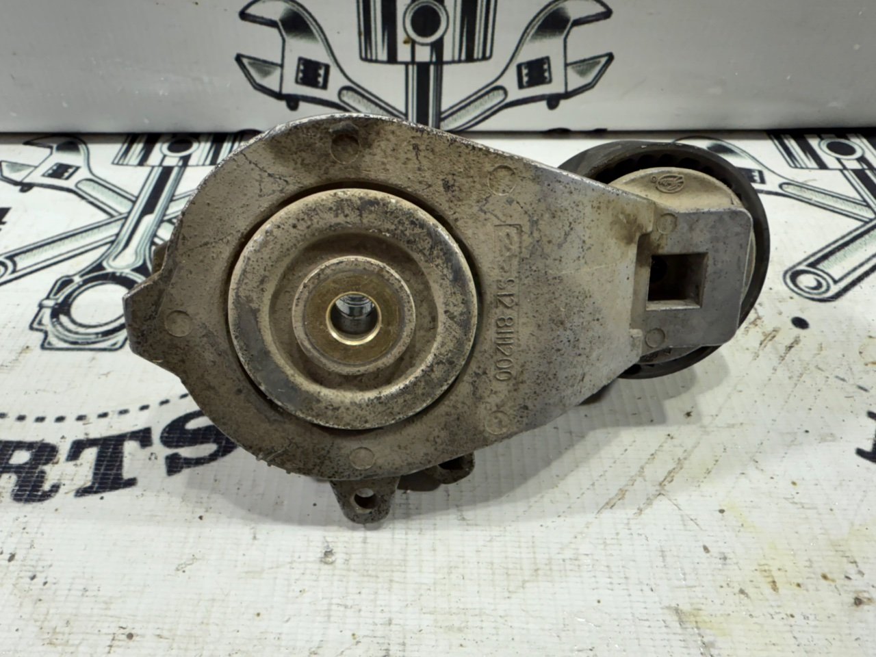 Натяжитель ремня генератора