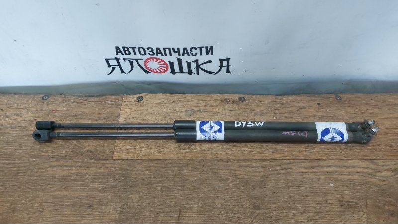 Амортизатор багажника Mazda Demio DY3R ZJVE (б/у)