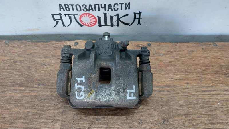 Суппорт тормозной Honda Airwave GJ1 L15A передний левый (б/у)