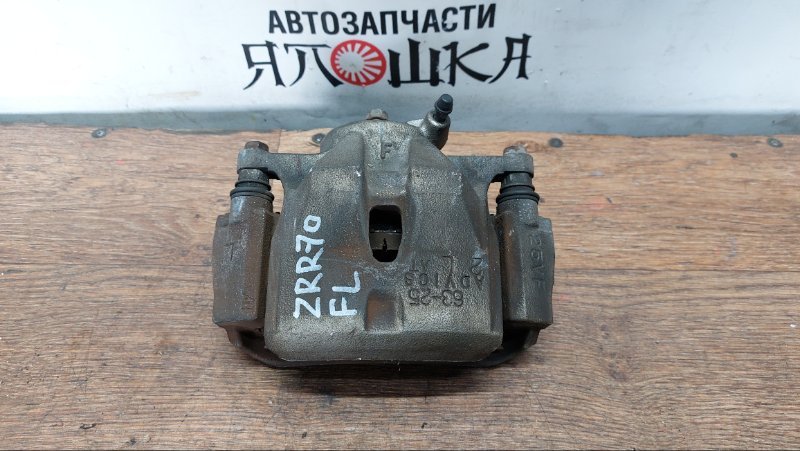 Суппорт тормозной Toyota Esquire ZRR70 2ZRFXE передний левый (б/у)