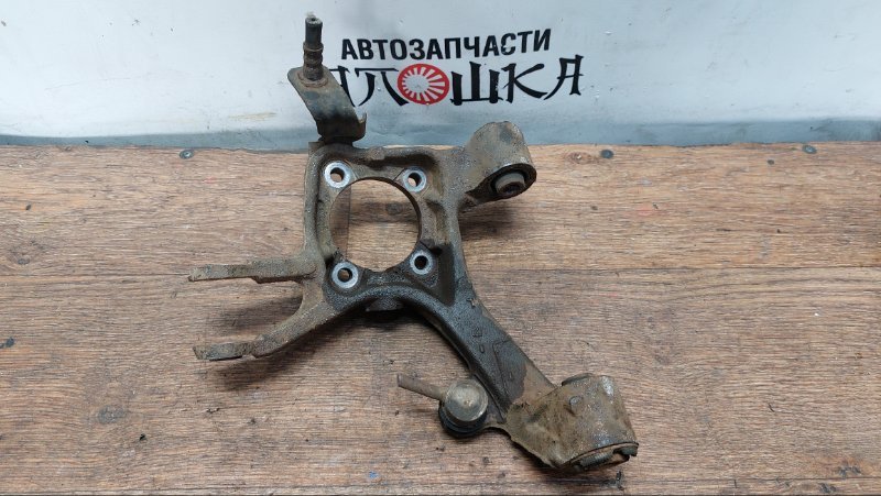 Цапфа Toyota Allex NZE124 1ZZFE задняя левая (б/у)