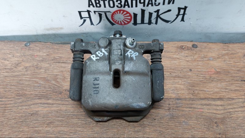Суппорт тормозной Honda Odyssey RB1 K24A задний правый (б/у)