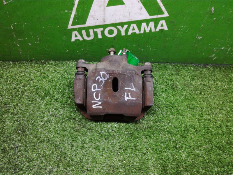 Суппорт Toyota Bb NCP30 передний левый (б/у)