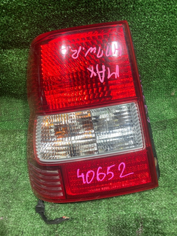 Стоп-сигнал Mitsubishi Pajero Io H77W 4G94 левый (б/у)
