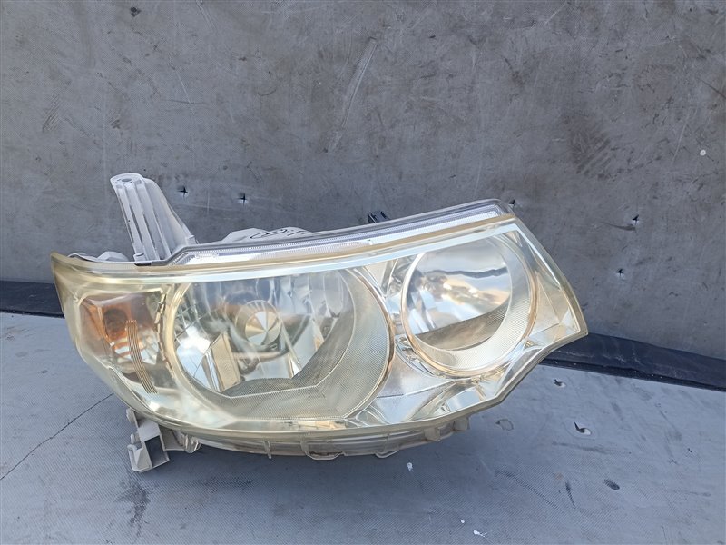 Фара DAIHATSU TANTO L375S правая (б/у)