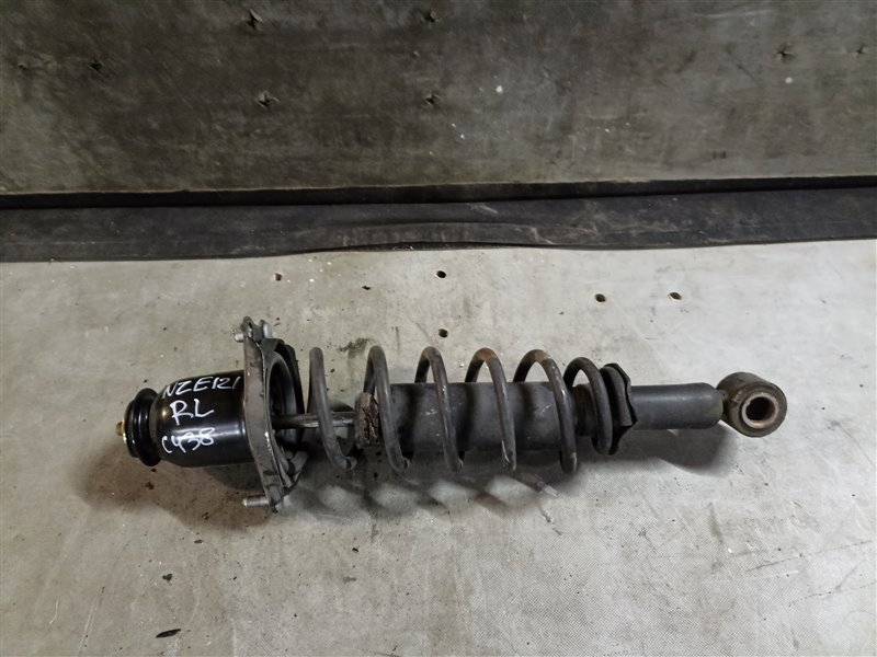 Стойка TOYOTA COROLLA FIELDER NZE121 1NZ-FE задняя левая (б/у)