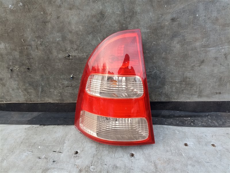 Стоп-сигнал TOYOTA COROLLA FIELDER NZE121 левый (б/у)