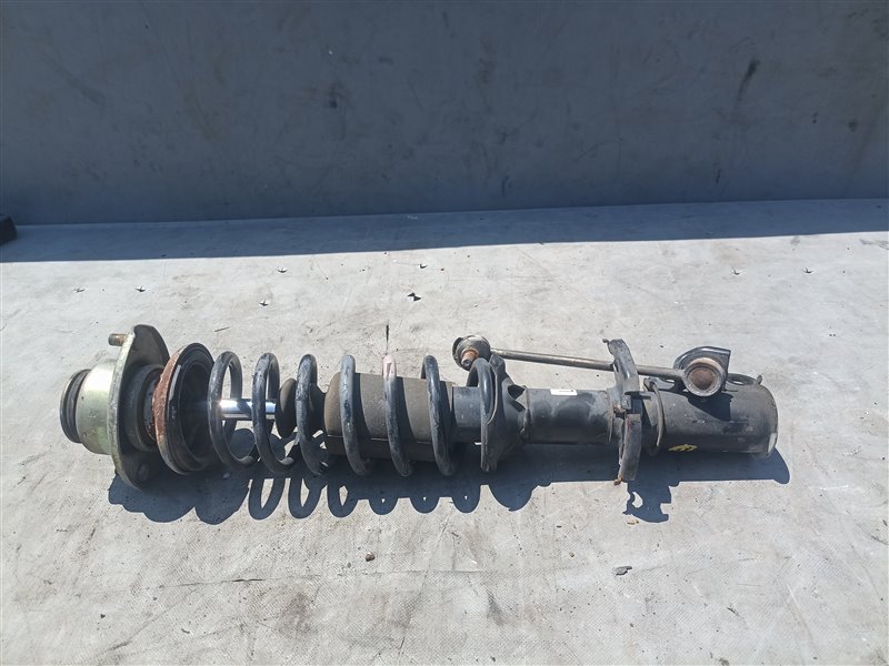 Стойка SUBARU PLEO RA1 EN07U передняя левая (б/у)