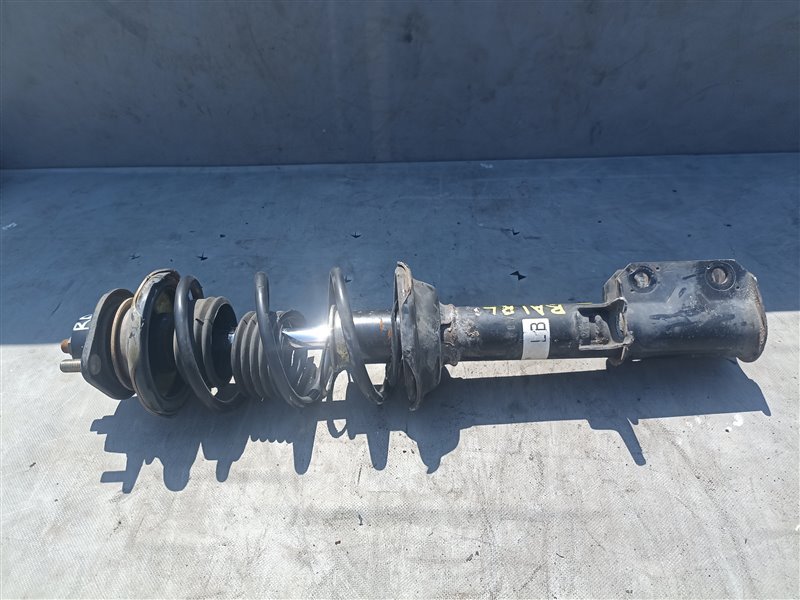 Стойка SUBARU PLEO RA1 EN07U задняя левая (б/у)