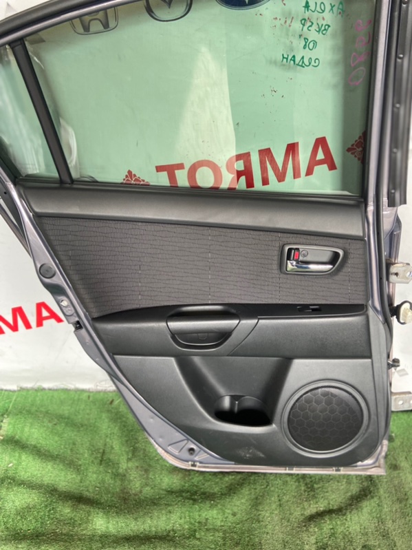 Обшивка дверей Mazda Mazda3 BK задняя левая