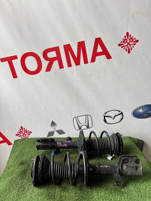Стойка Toyota Avensis ADT250 передняя