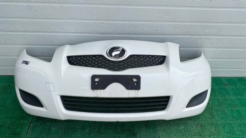 Бампер Toyota Vitz KSP90 передний (б/у)