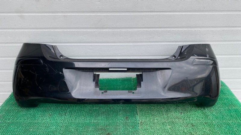 Бампер Toyota Vitz SCP90 задний (б/у)