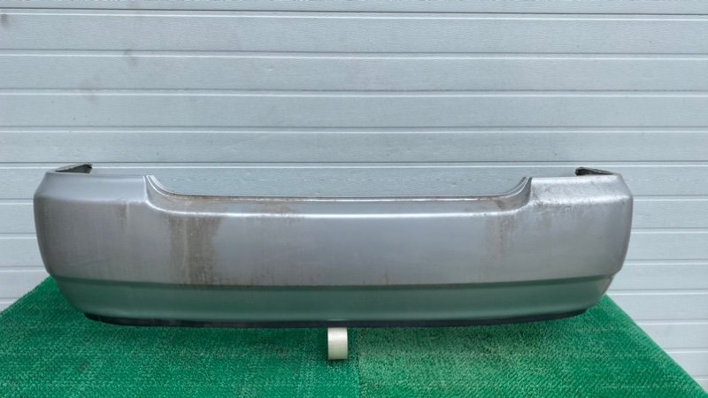 Бампер Toyota Corolla ZZE124 задний (б/у)