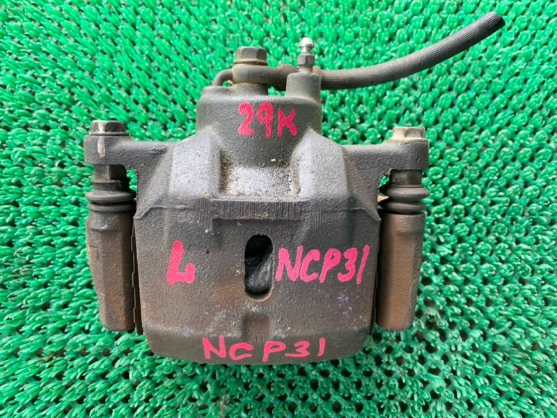 Суппорт Toyota Bb NCP31 передний левый (б/у)