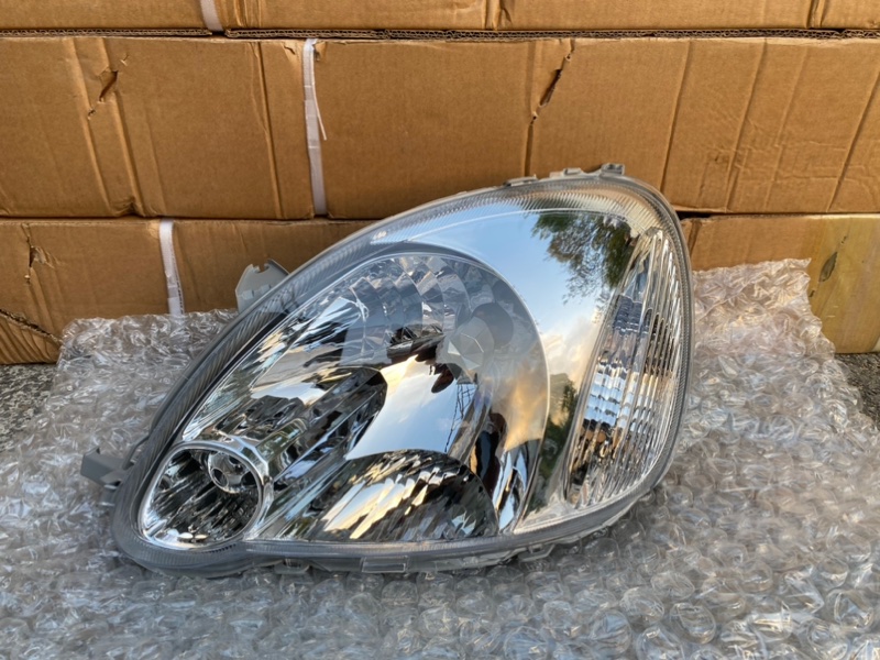 Фара TOYOTA VITZ NCP10 передняя левая