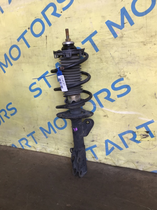 Стойка передняя левая HONDA FIT GD1 L13A Стойка передняя левая HONDA FIT GD1 L13A