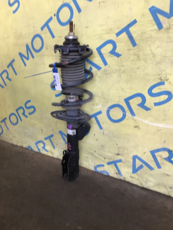 Стойка передняя левая HONDA FIT GD1 L13A