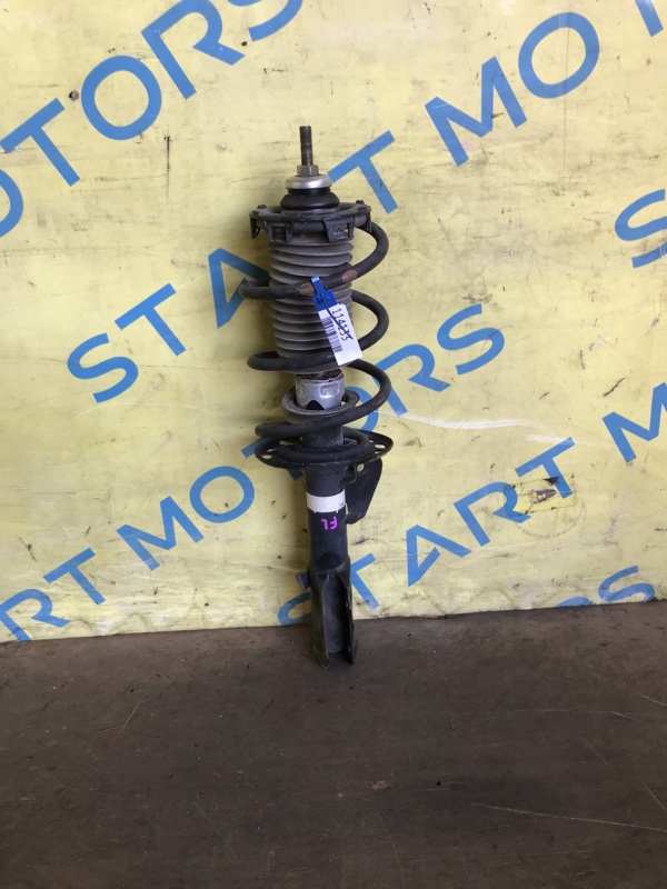 Запчасть стойка передняя левая HONDA FIT GD1 L13A контрактная Стойка передняя левая HONDA FIT GD1 L13A контрактная
