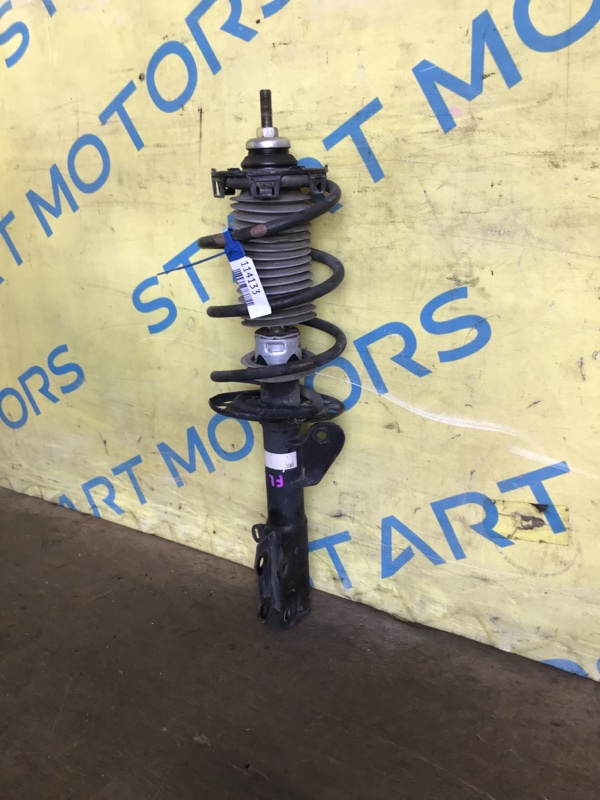 Стойка передняя левая HONDA FIT GD1 L13A Стойка передняя левая HONDA FIT GD1 L13A