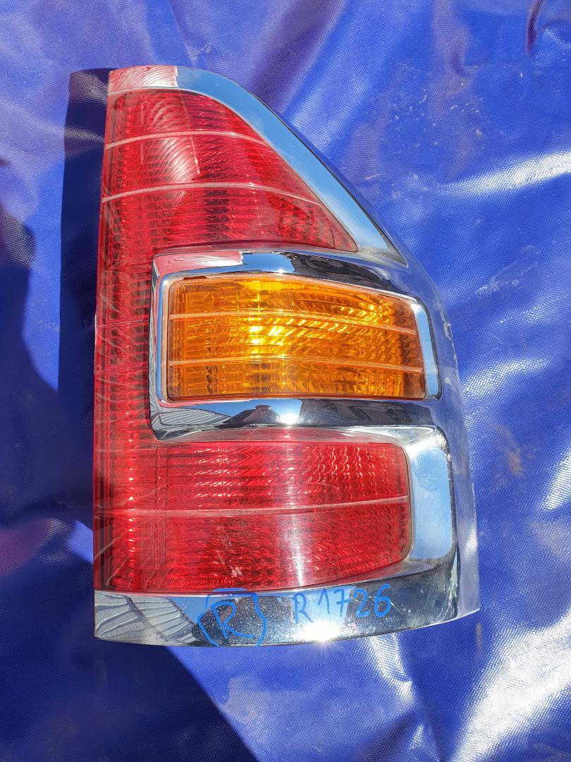 Стоп-сигнал Mitsubishi Pajero V63W задний правый (б/у)