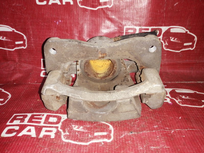 Суппорт передний правый TOYOTA RACTIS NCP105