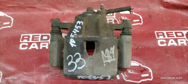 Суппорт передний левый TOYOTA RACTIS NCP100 47750-52211 контрактная