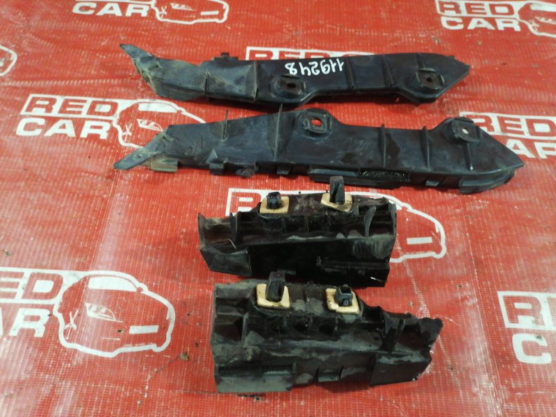 Крепление бампера Toyota Corolla Runx NZE121-5061071 1NZ-A777717 2003 заднее (б/у)