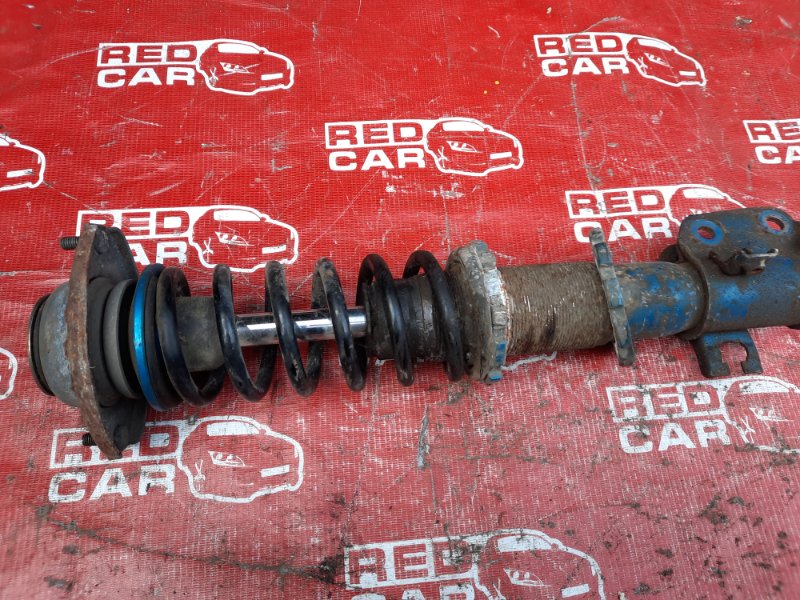 Стойка Suzuki Kei HN22S-758067 K6A-2466607 2003 передняя правая (б/у)