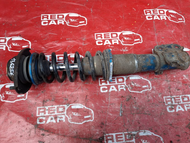Стойка Suzuki Kei HN22S-758067 K6A-2466607 2003 передняя левая (б/у)