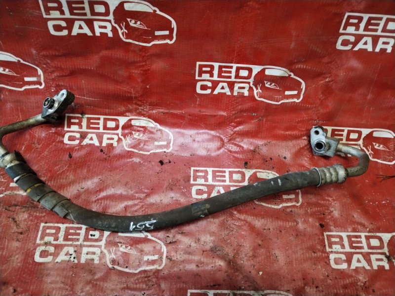 Шланг кондиционера Toyota Porte NNP11-0018653 1NZ-B490292 2004 (б/у)